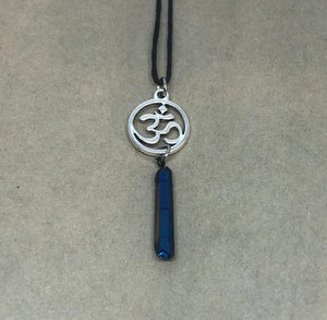 Om Symbol with Blue Rainbow Crystal